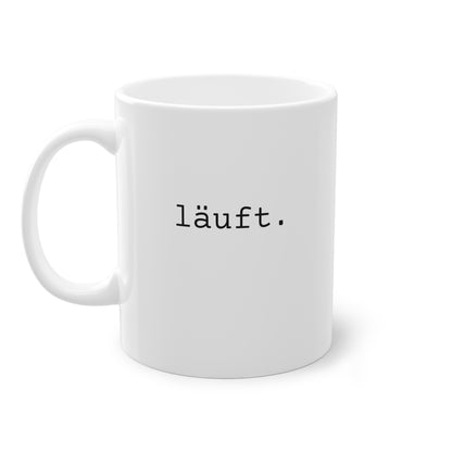 Weisse Design Tasse "läuft."